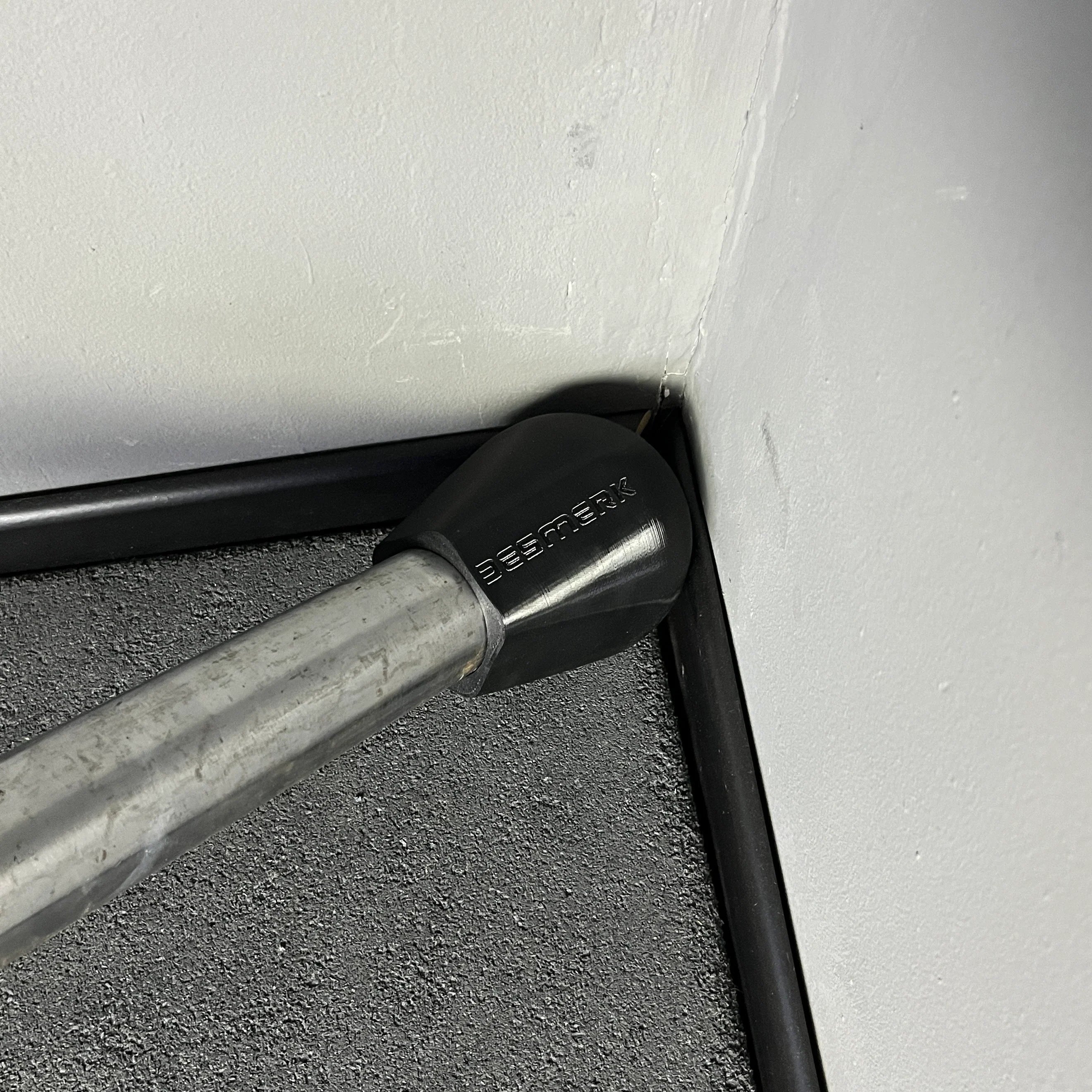 Landmine mounted to power rack in home gym