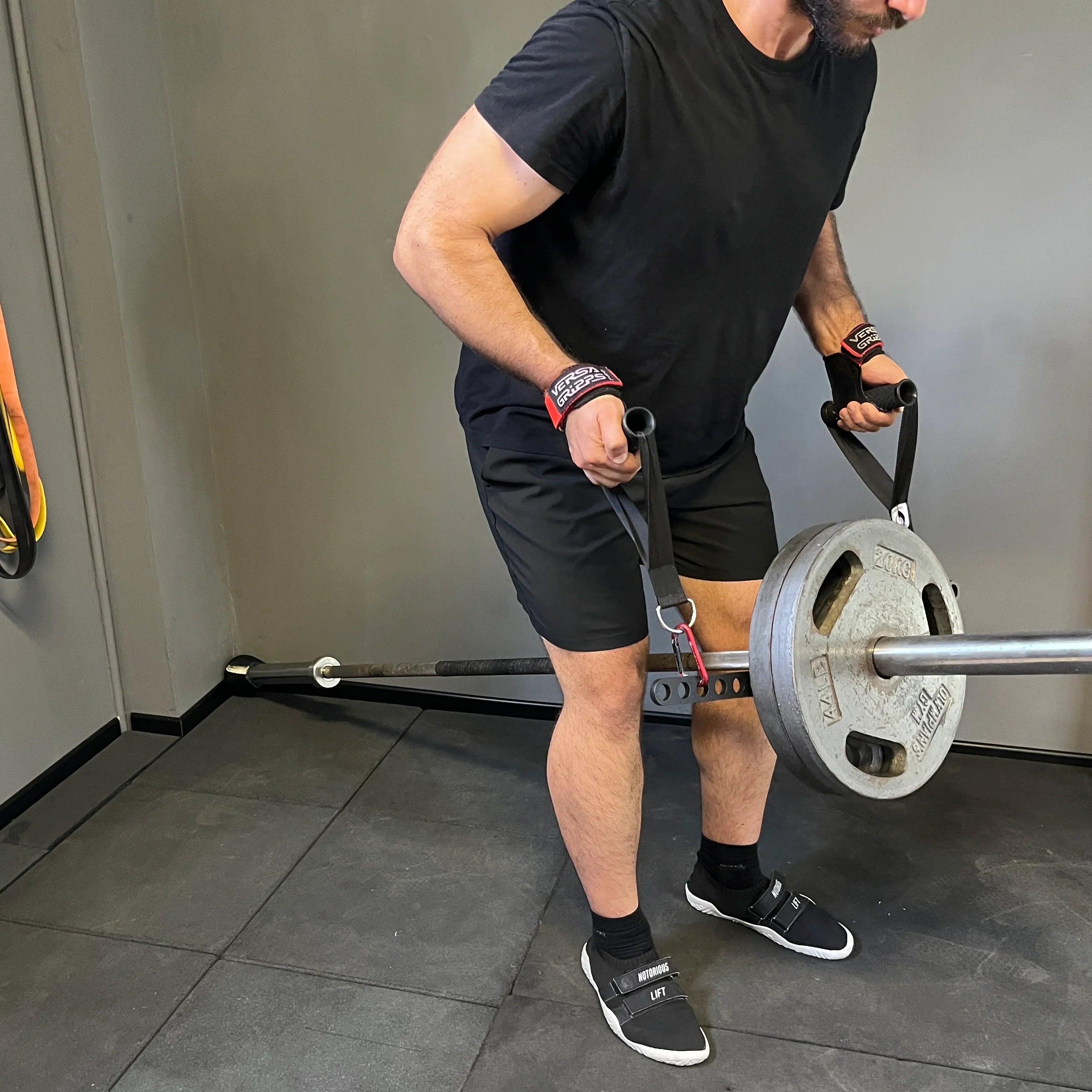 Landmine mounted to power rack in home gym