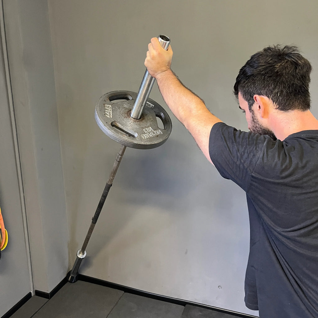 Landmine mounted to power rack in home gym